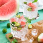 sliced watermelon with lemon on shot glass