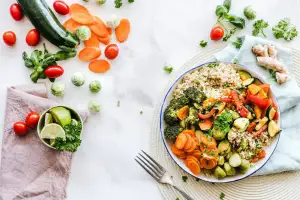 Colorful vegetable bowl flat lay