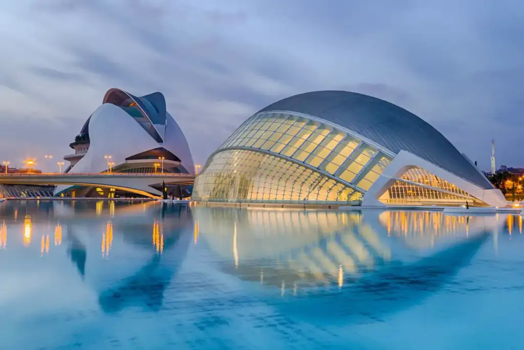 Futuristic arts complex reflected in water
