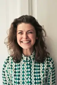 Laughing woman with curly hair